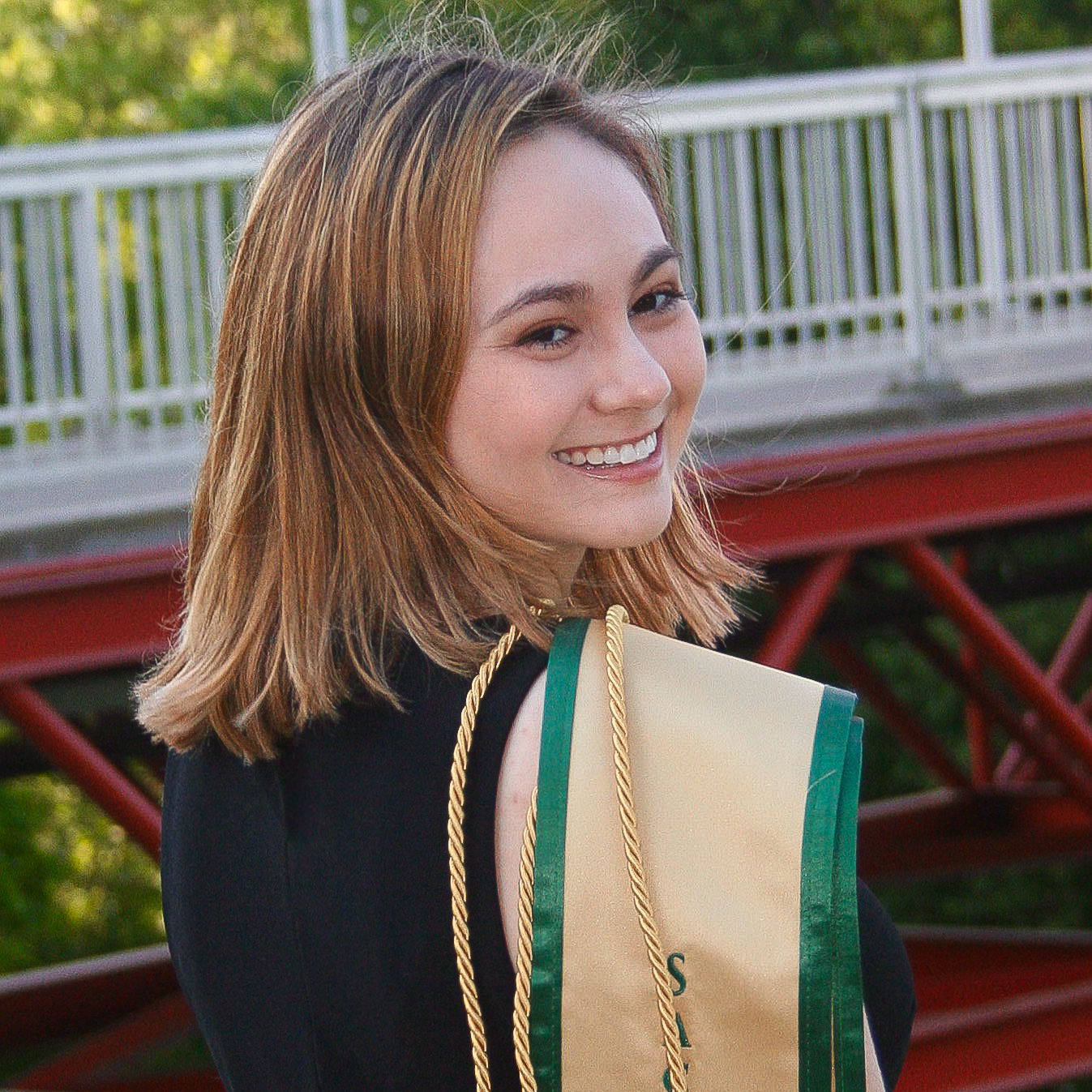 A photo of Lillian Murphy in graduation regalia