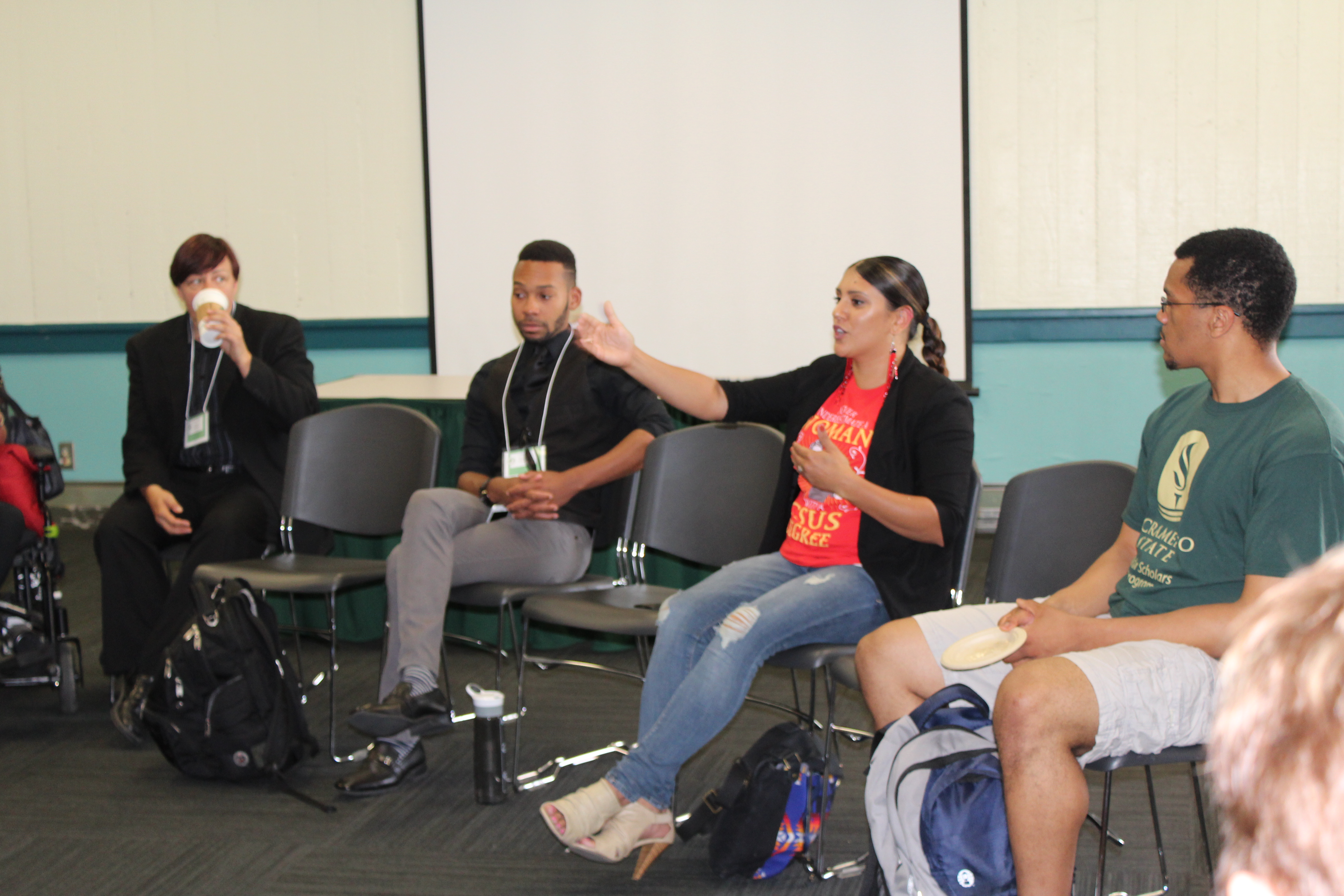 Sac State students group discussion photo at conference.