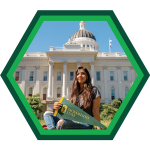 Student in front of Sacramento capitol building.
