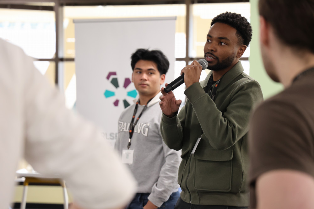 African American male with green sweatshirt