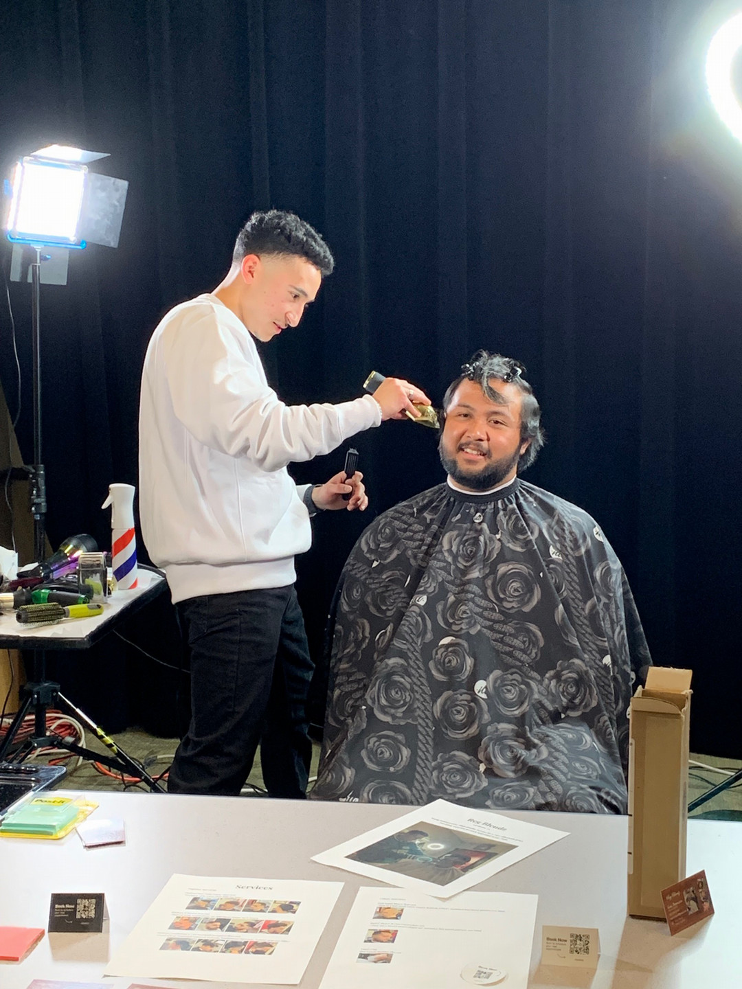 Student and professional barber, Gael Regalado, works his magic!