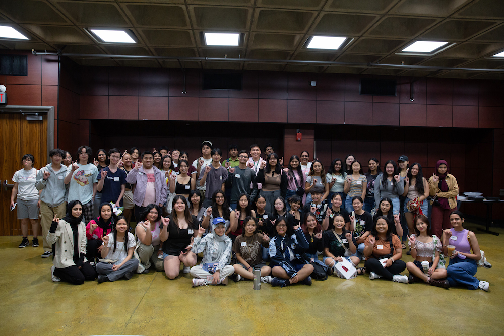 A group of FCP Students looking and smiling at the camera.