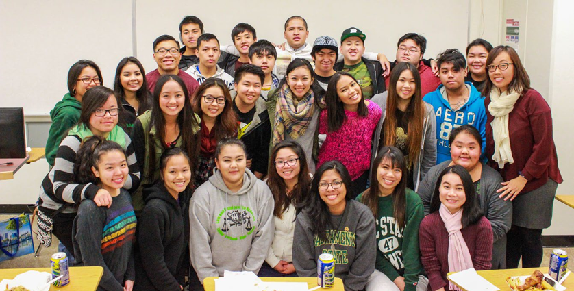 A group of FCP students smiling at the camera.