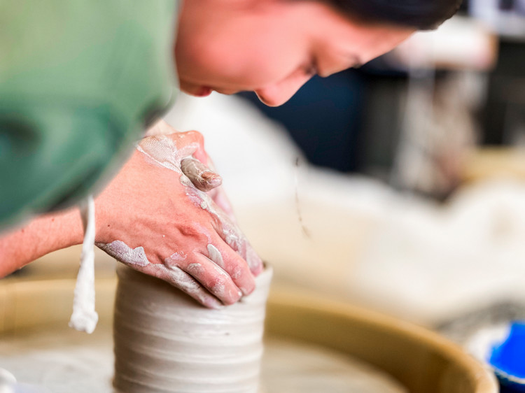 Potery and Ceramics in motion with Art student at the machine