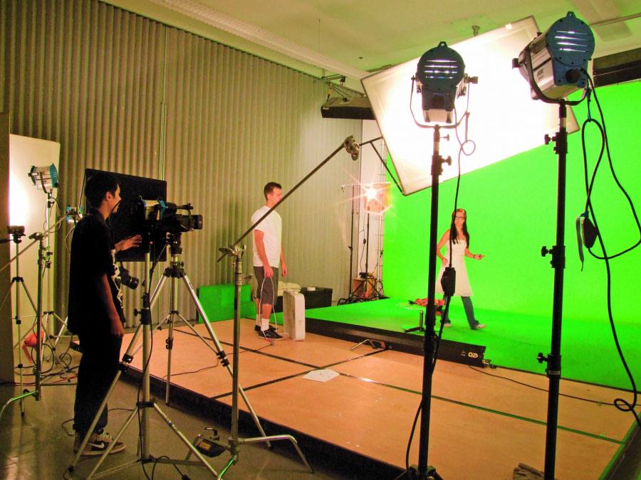 The contemporary professional photo studio with green screen.