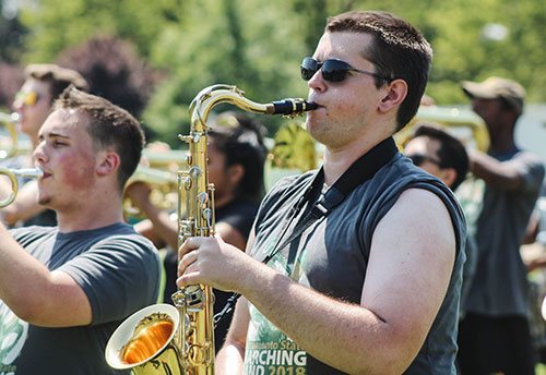 Band camp participant playing saxophone.