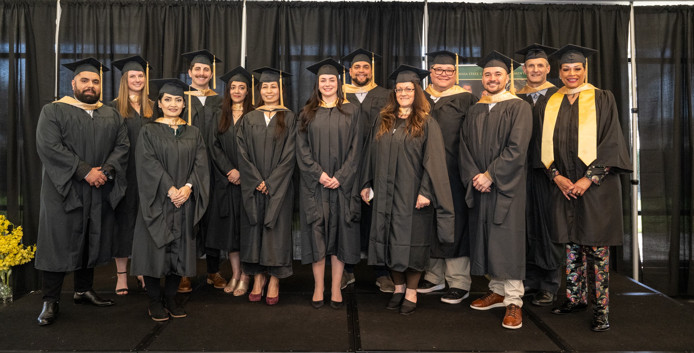 EMBA students at graduation