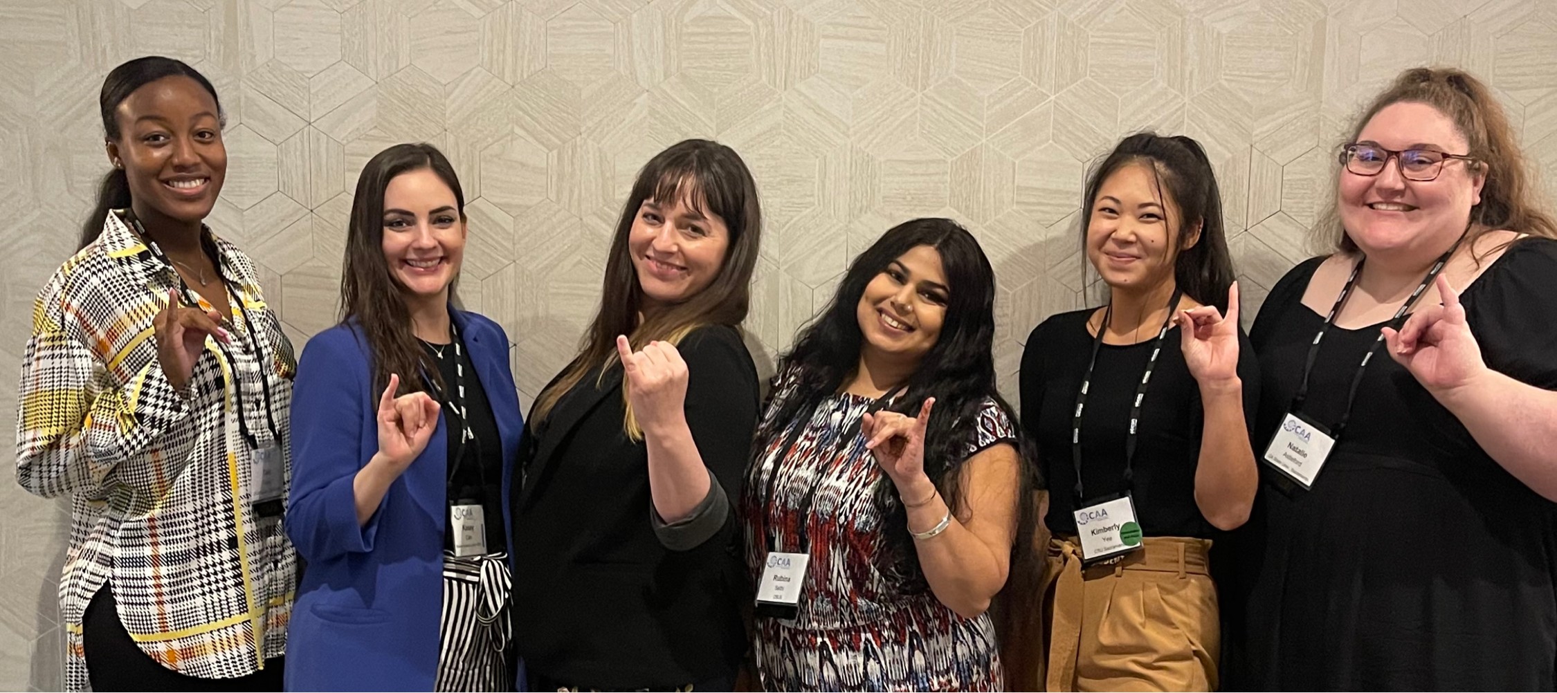 “Students attending the California Academy of Audiology conference. Stingers up!”