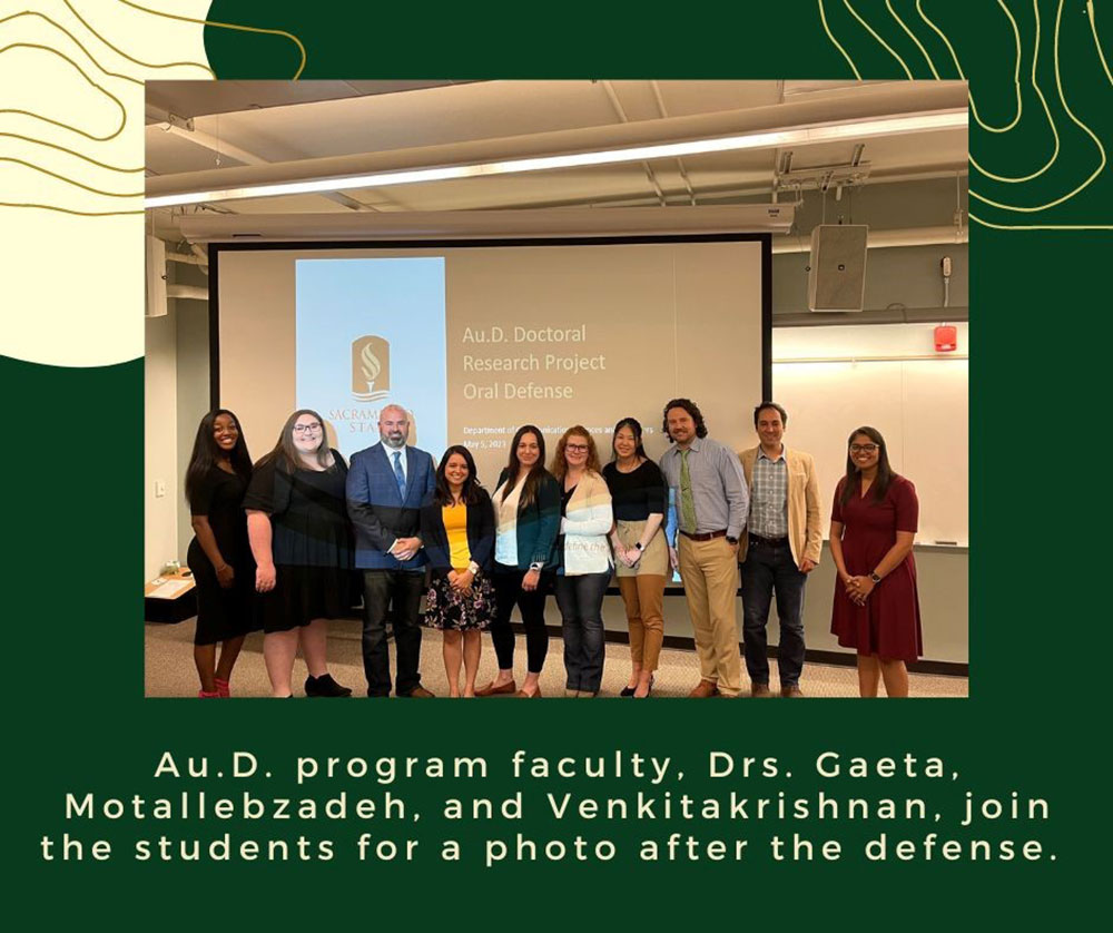 Au.D. faculty and students photo at student research defense. 