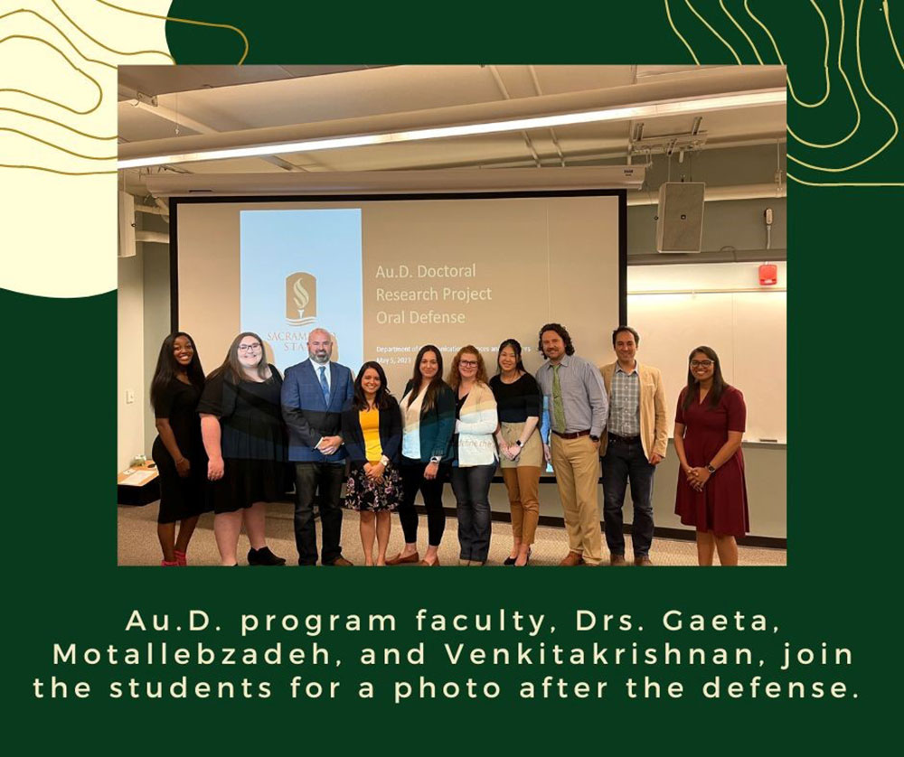 Au.D. faculty and students photo at student research defense.