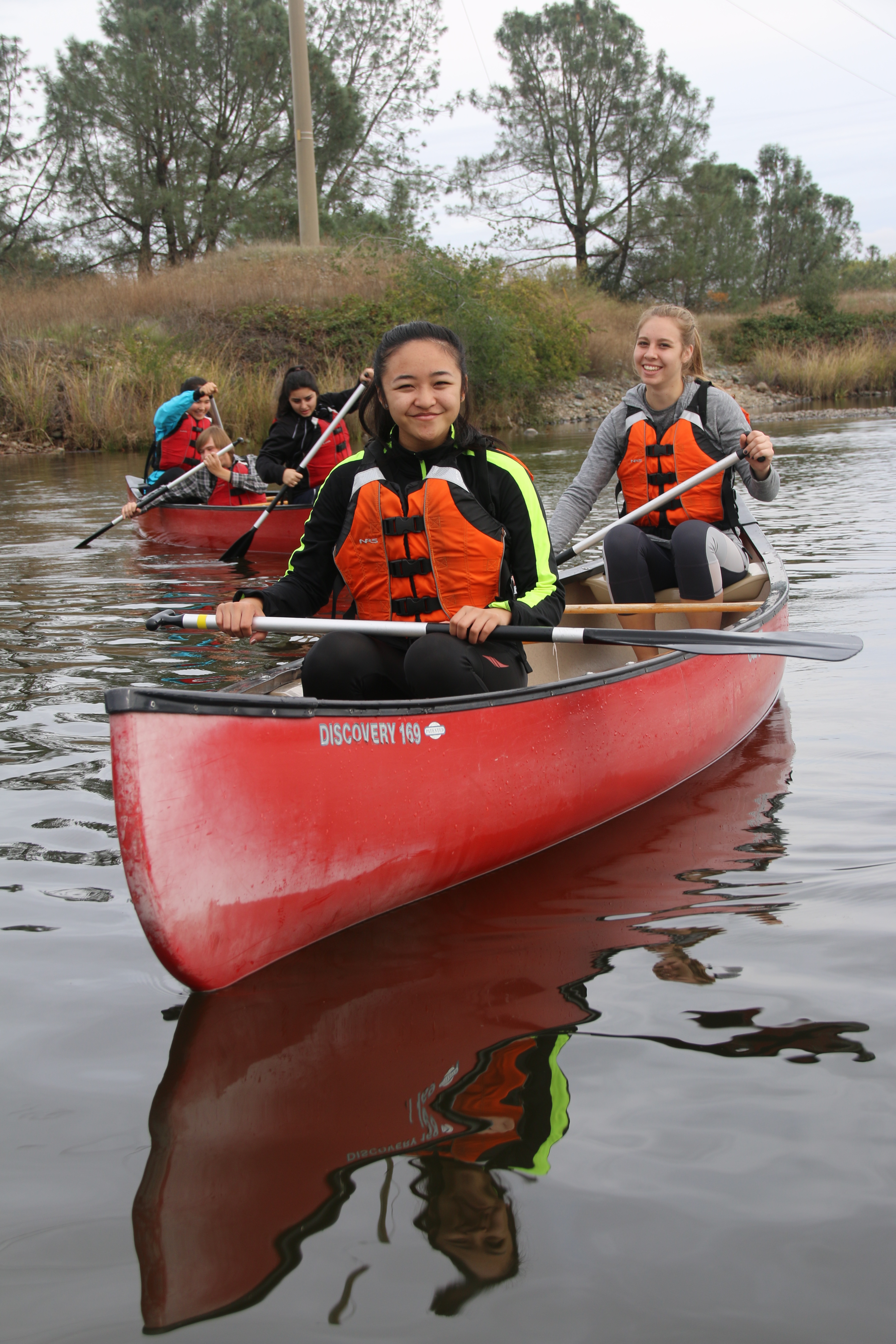 two students in a kayak
