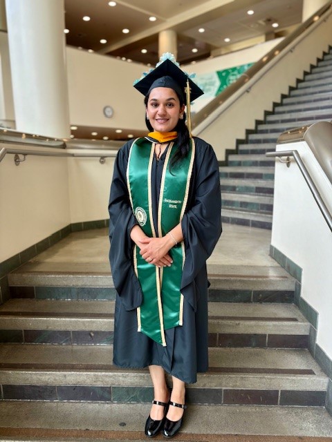 Arjupun in graduation robe