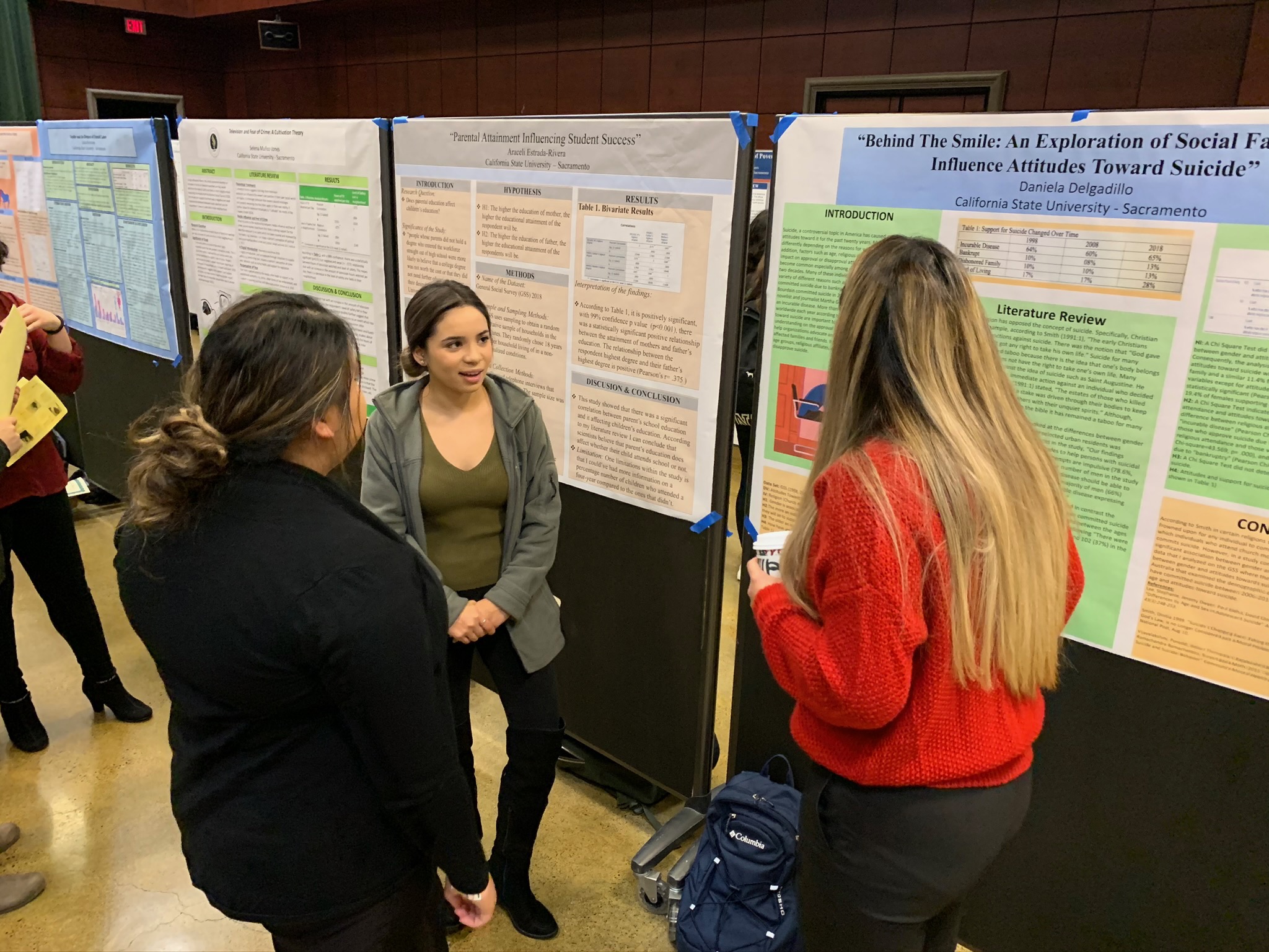 Araceli Estrada-Rivera presenting their research topic "Parental Attainment Influencing Student Success."