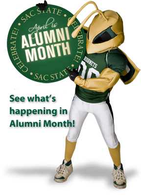 Herky the Hornet holding sign saying: "April is Alumni Month"