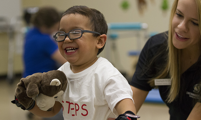 STEPS program helps neuro-motor impaired child learn to walk