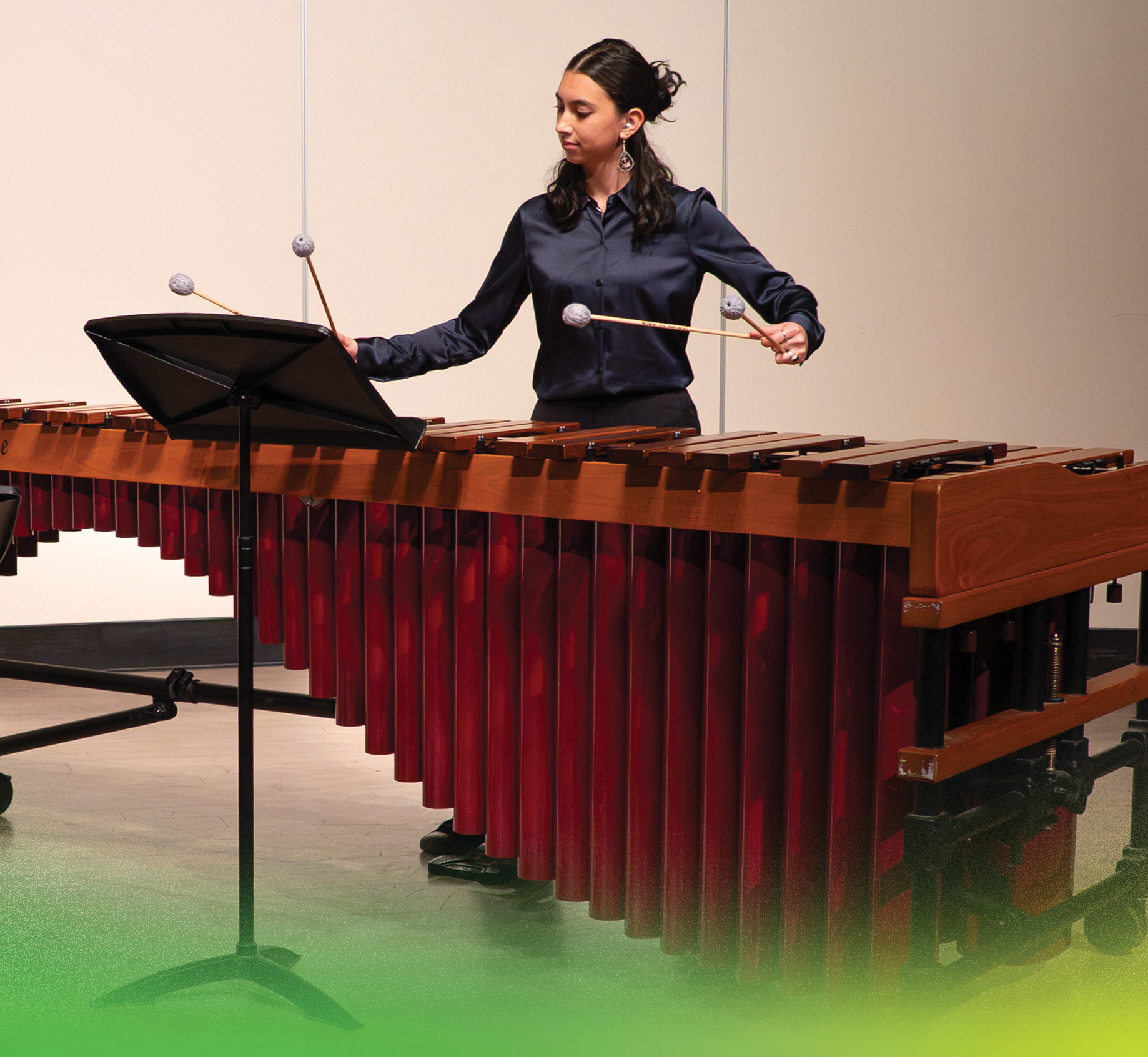 Photo: music student playing instrument