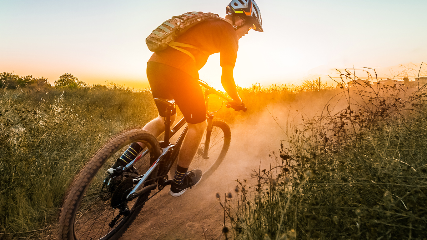 Mountain biker with sun 