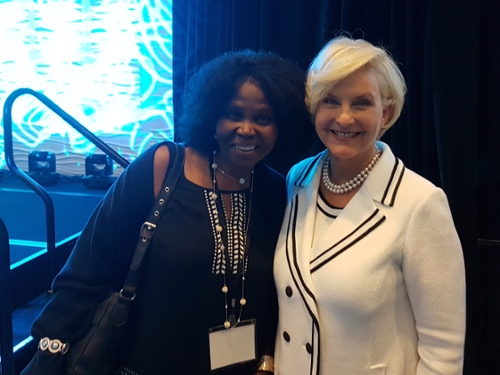 Image of 2 people at Nobel Peace Prize forum