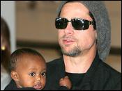 Brad Pitt holds Angelina Jolie's daughter Zahara, Narita, Japan