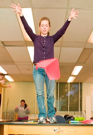 Person dropping a parachute