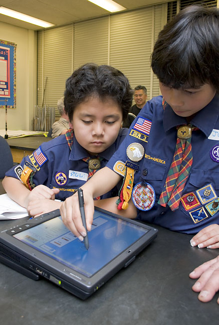 Picture of scout(s) doing physics experaments