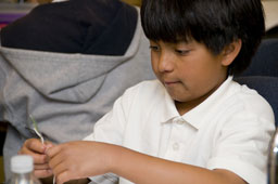 Picture of scout(s) doing physics experaments. Select (click) picture to view it enlarged.