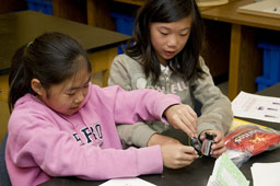 Picture of scout(s) doing physics experaments. Select (click) picture to view it enlarged.