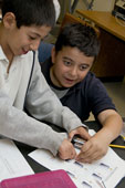 Picture of scout(s) doing physics experaments. Select (click) picture to view it enlarged.