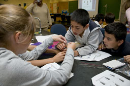 Picture of scout(s) doing physics experaments. Select (click) picture to view it enlarged.