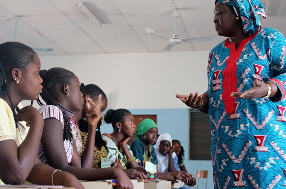 Peace Corps instruction with a classroom of students