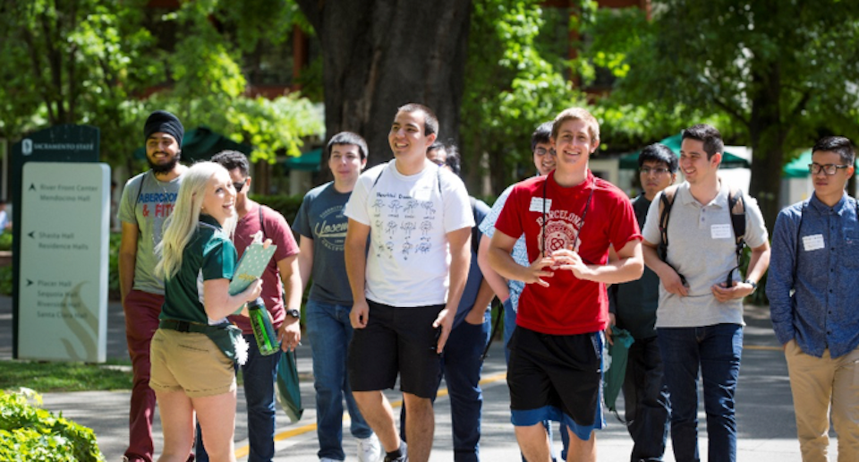 Image of a group of students walking on campus