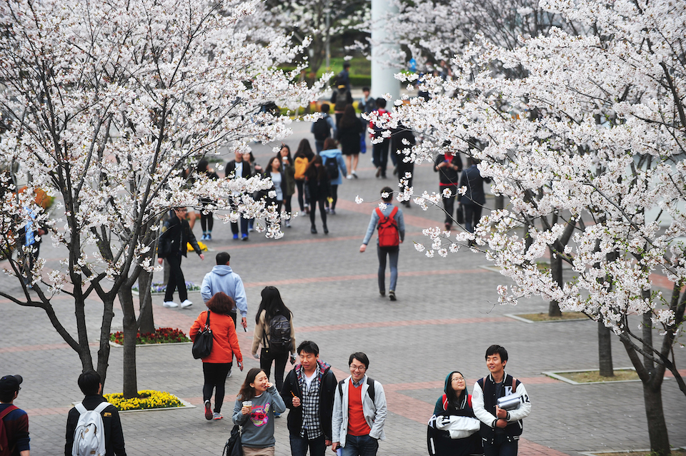 Students walking on the campus at Konkuk University.