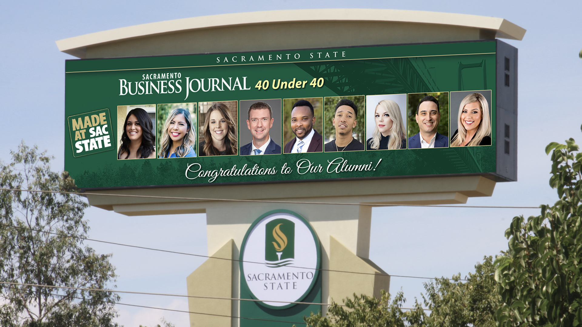 An electronic billboard displaying pictures of the nine Sac State alumni 40 Under 40 honorees