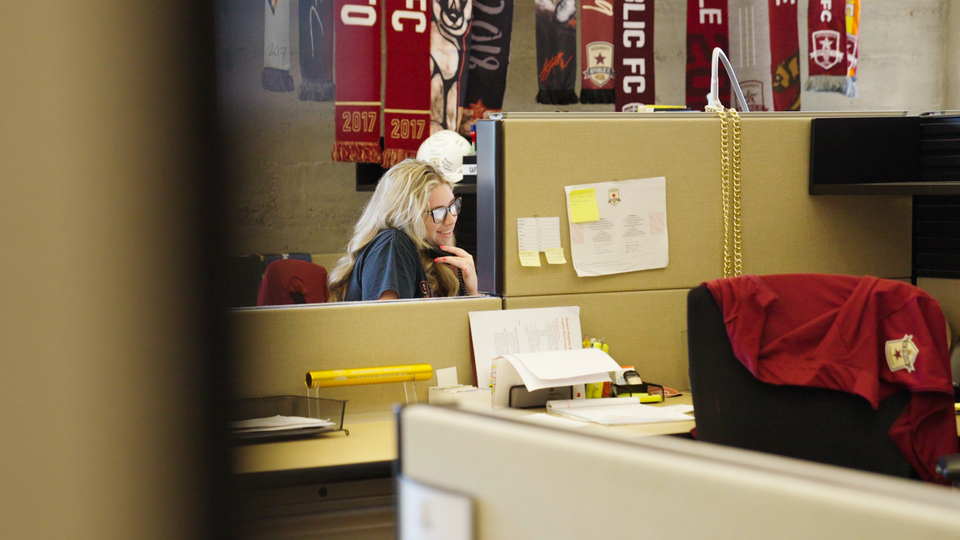 A Sacramento Republic FC employee takes a phone call in the team's offices.