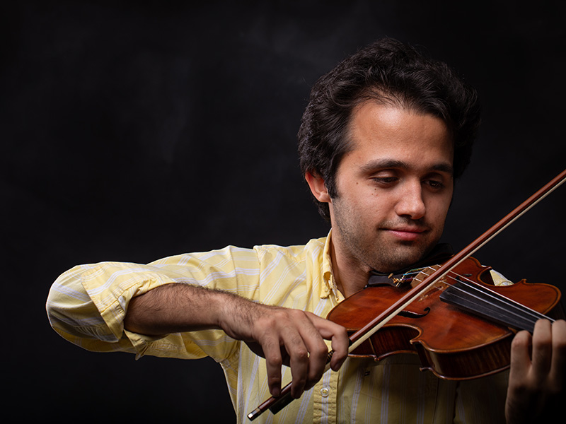 Ardalan Gharachorloo plays his violin