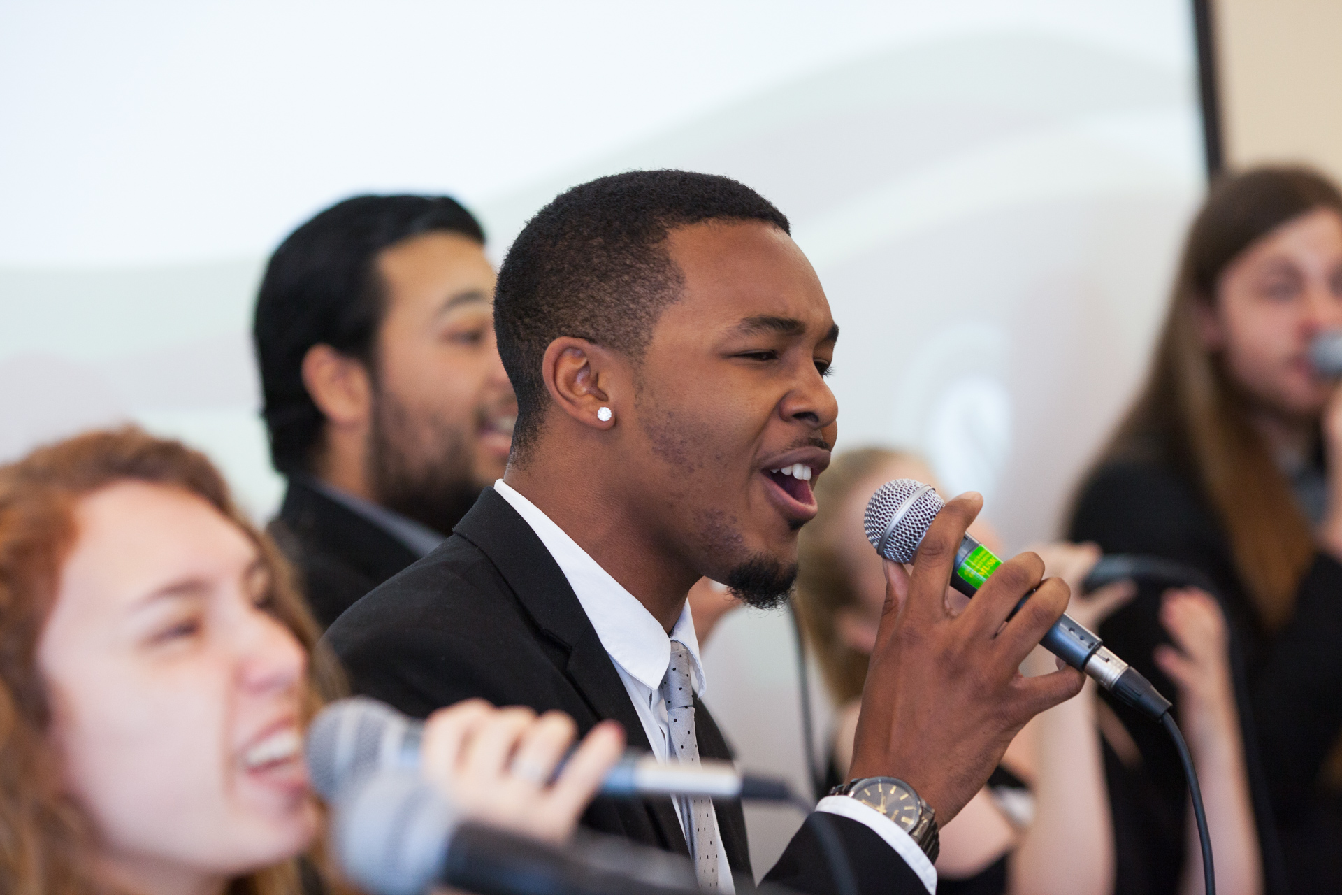 Members of Vocal Jazz Ensembles give a performance.