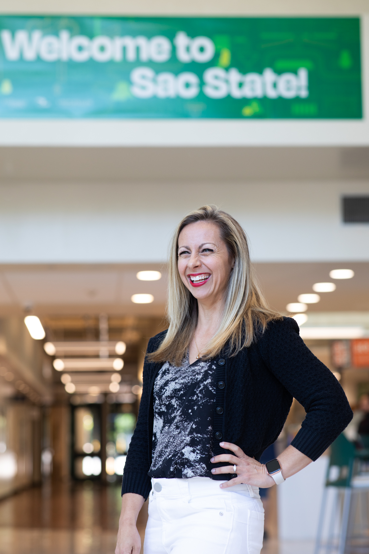 Parents and Families Program Director Haley Myers Dillon poses with a smile in the University Union.