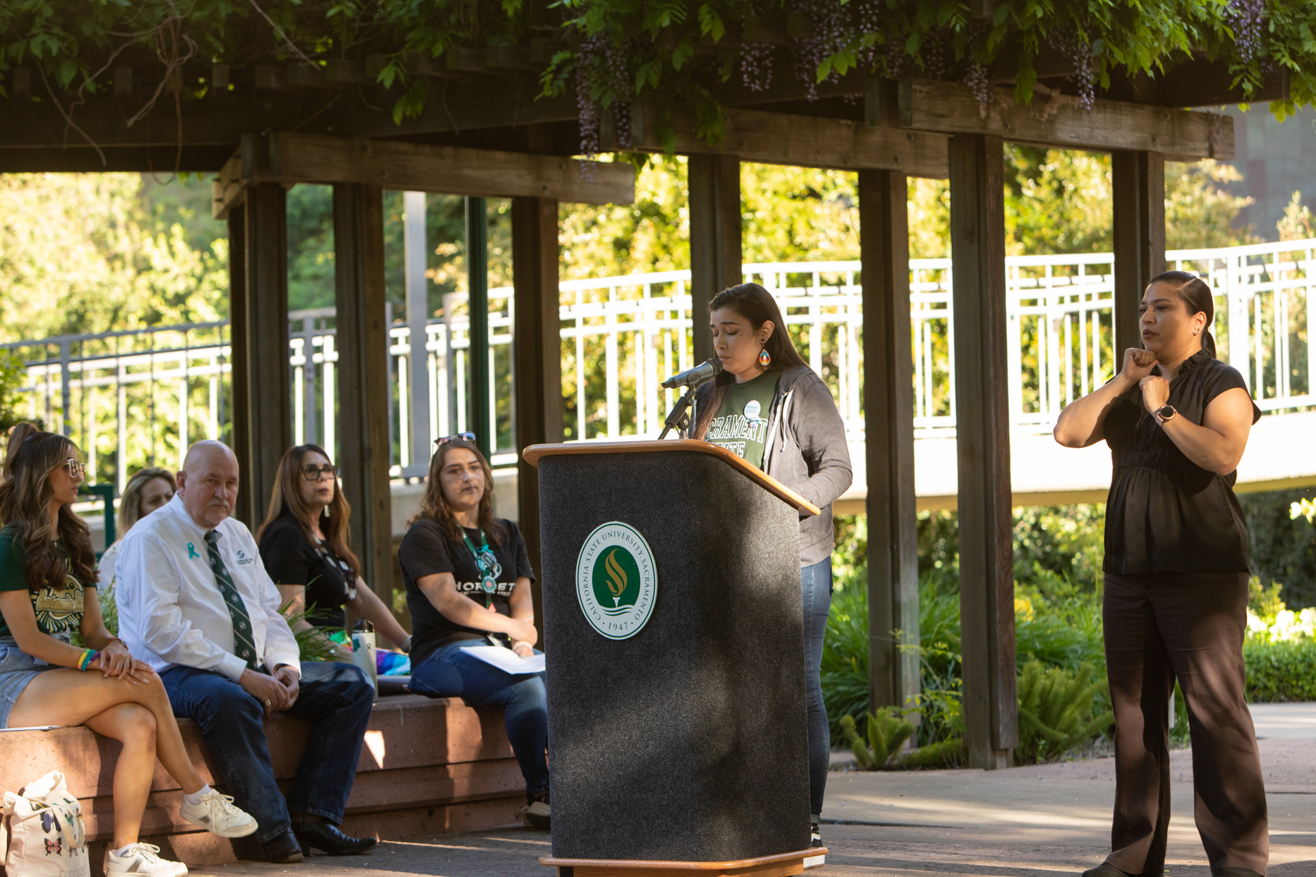 A speaker discusses the impacts of sexual violence at Take Back the Night. 