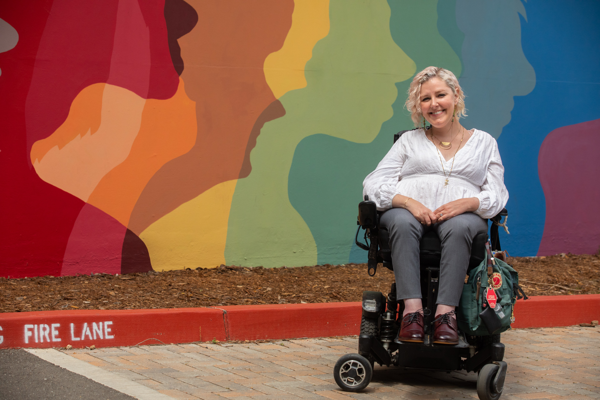 Rachel Stewart visits the antiracism and inclusion art murals at Santa Clara Hall on campus.