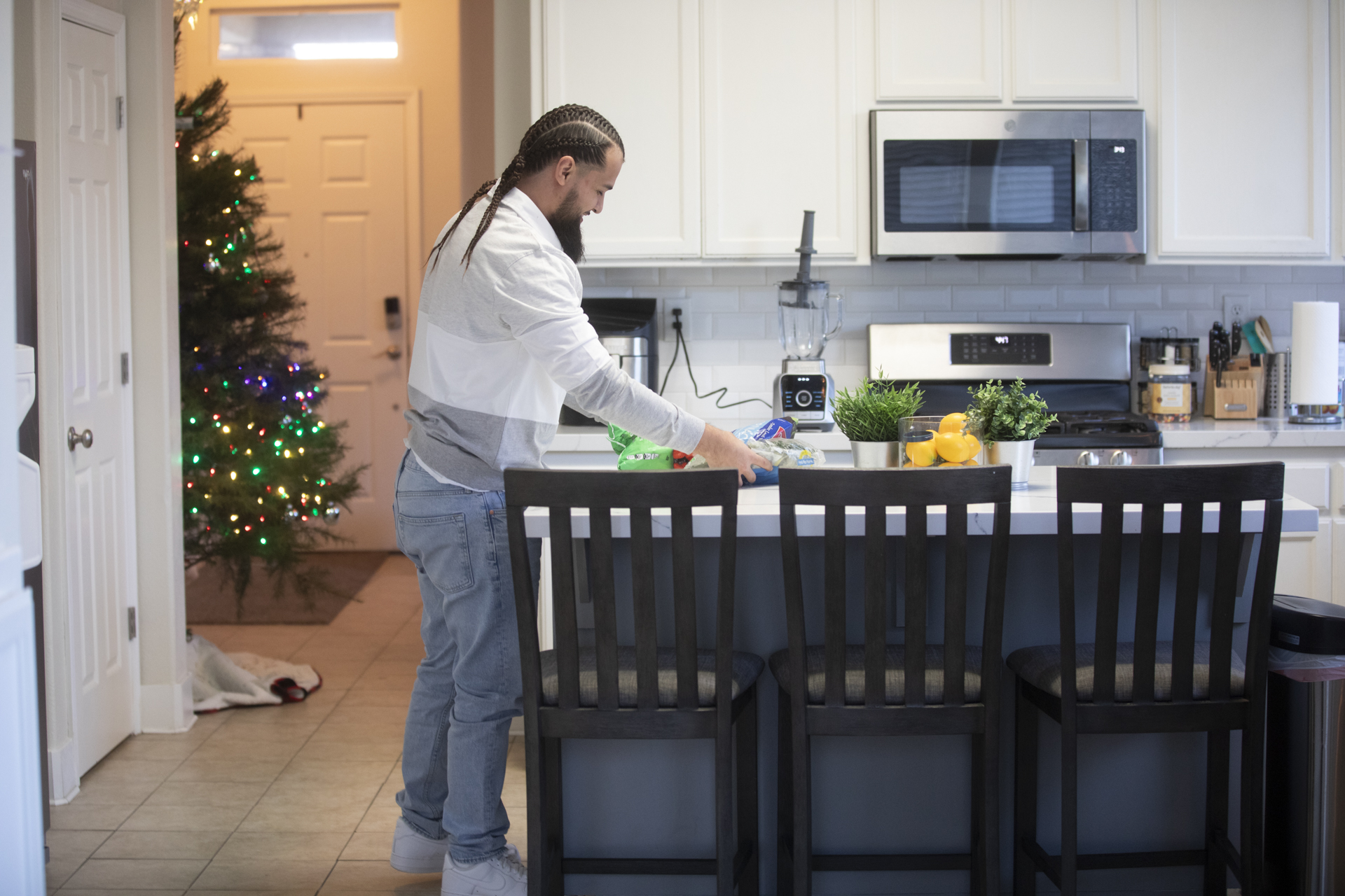 Jon Hernandez cooking in a kitchen.