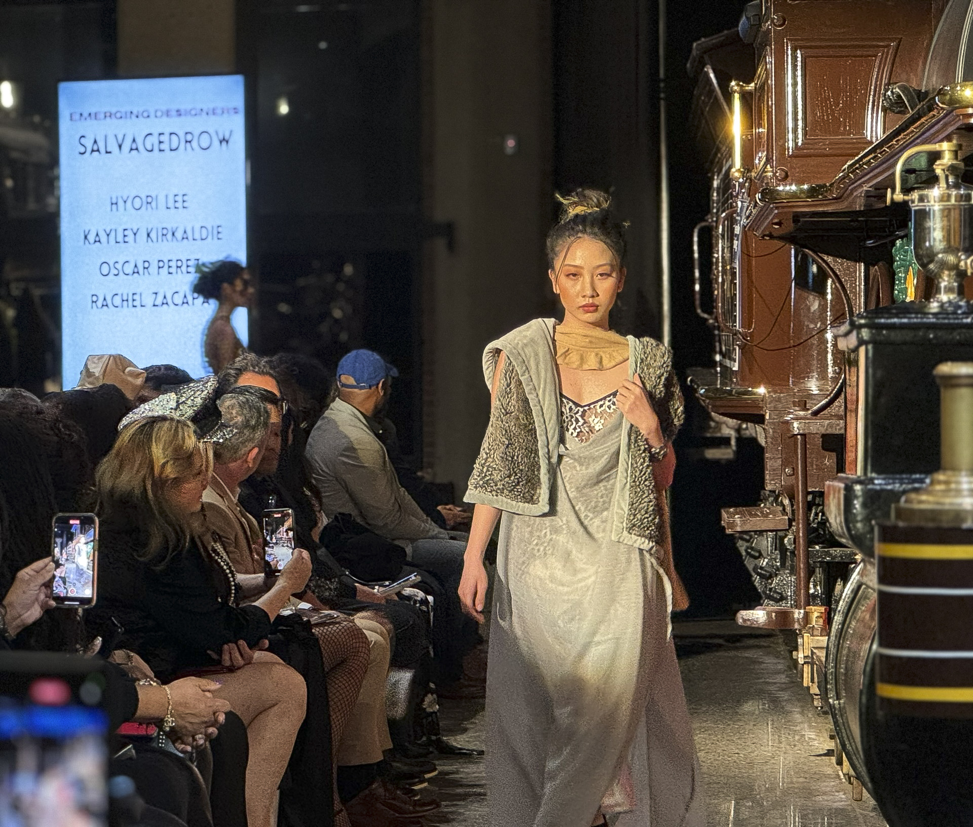 A student models Fashion Week Sacramento clothing. 