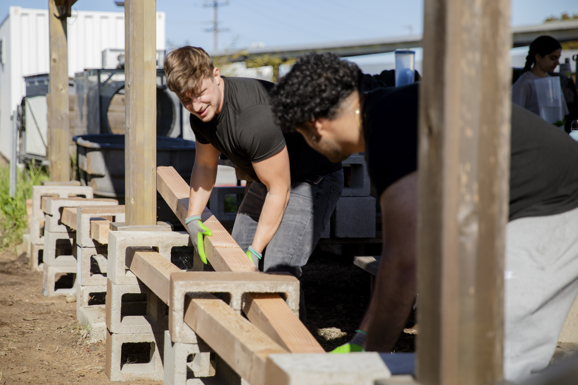 Students work on a project in the community during Alternative Spring Break.