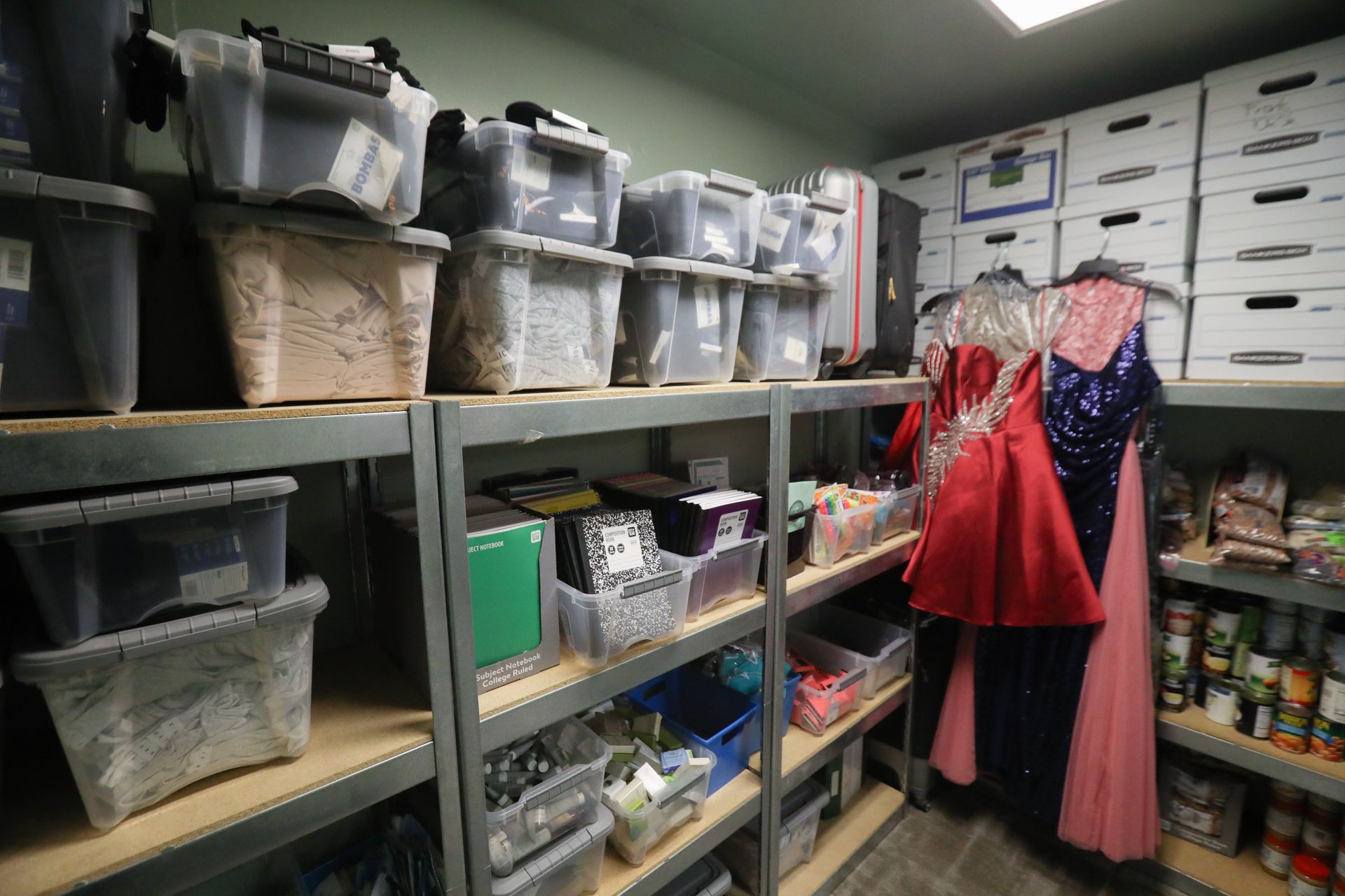 A supply closet at the Guardian Scholars Program center with supplies and resources for students.