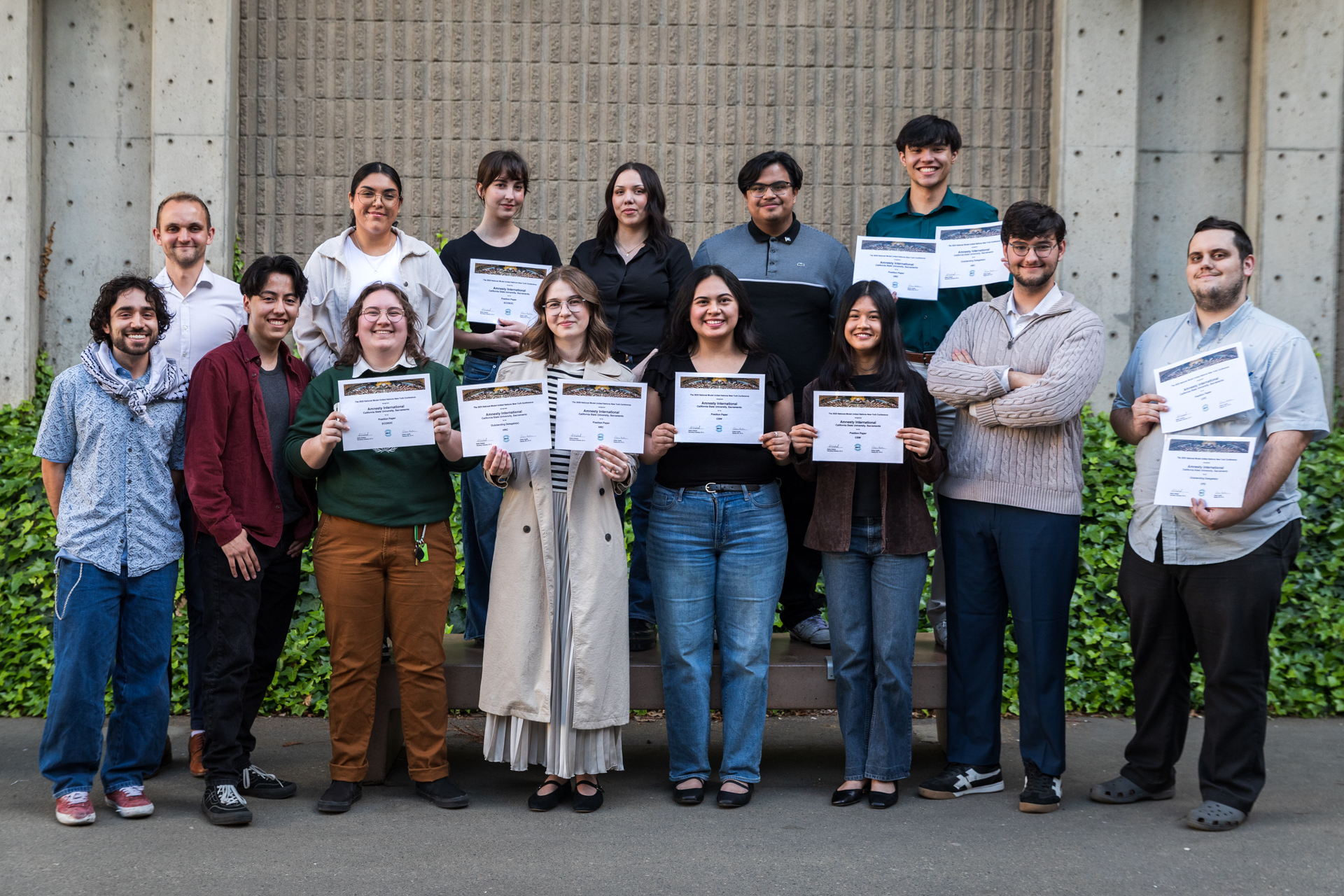 Sac State's Model UN team posing with their awards. 