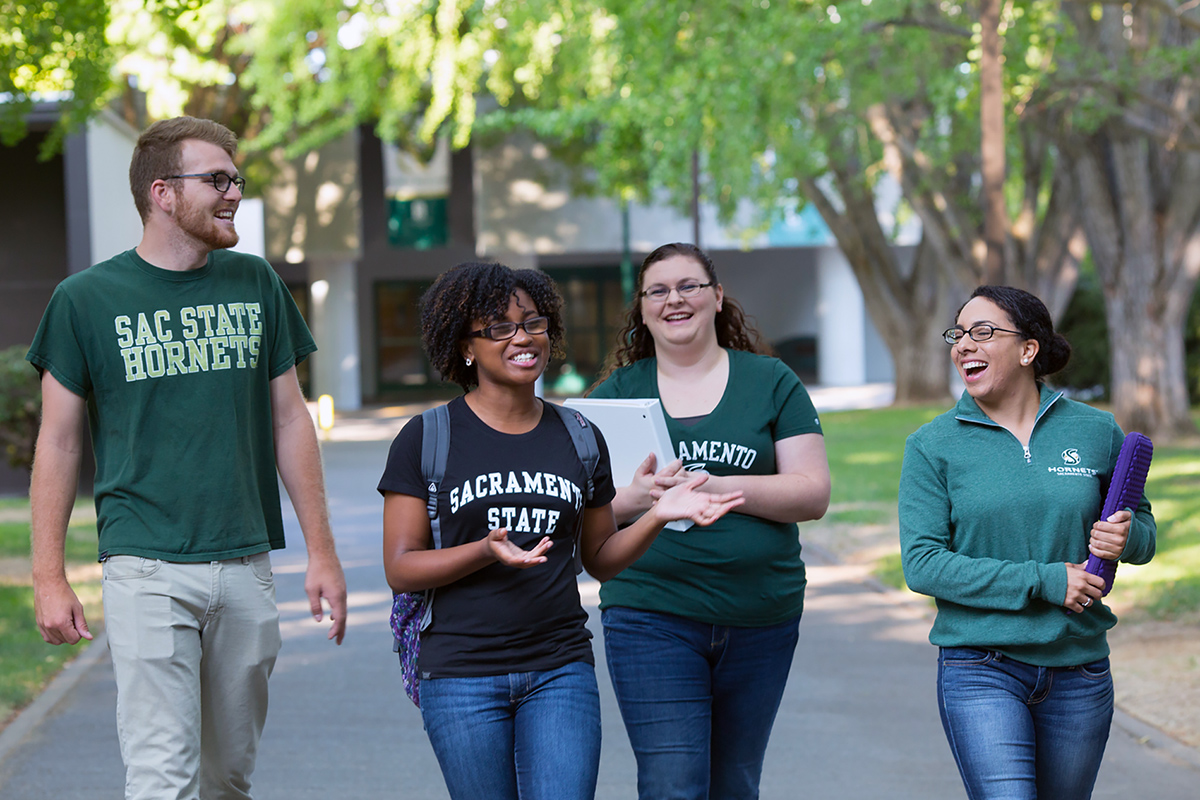 A rendering of the planned Sac State Capital Campus with buildings on the side and Capitol building in middle.