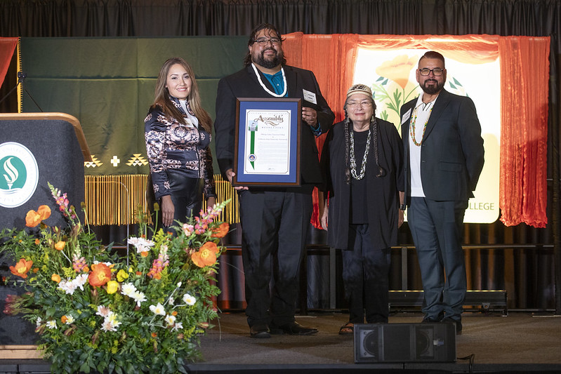 Members of the Wileety Native American College receiving a California Legislature Assembly Resolution
