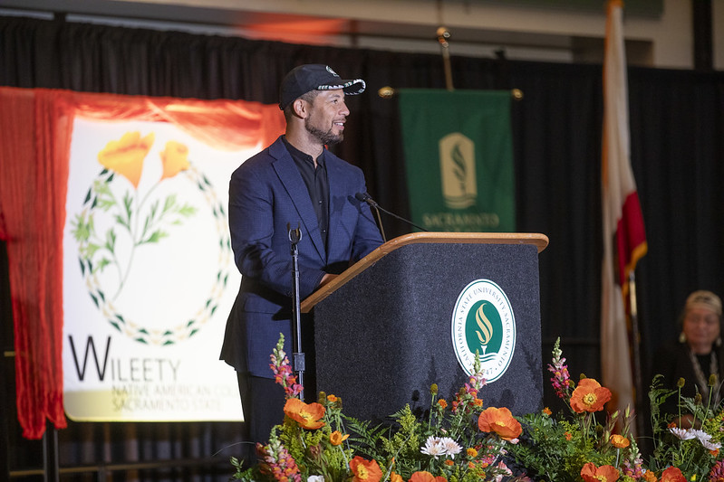 President Luke Wood giving a speech at the grand opening