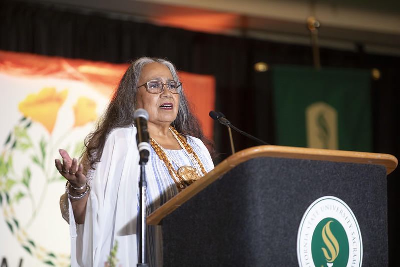 Mary Tarango giving opening remarks at the grand opening
