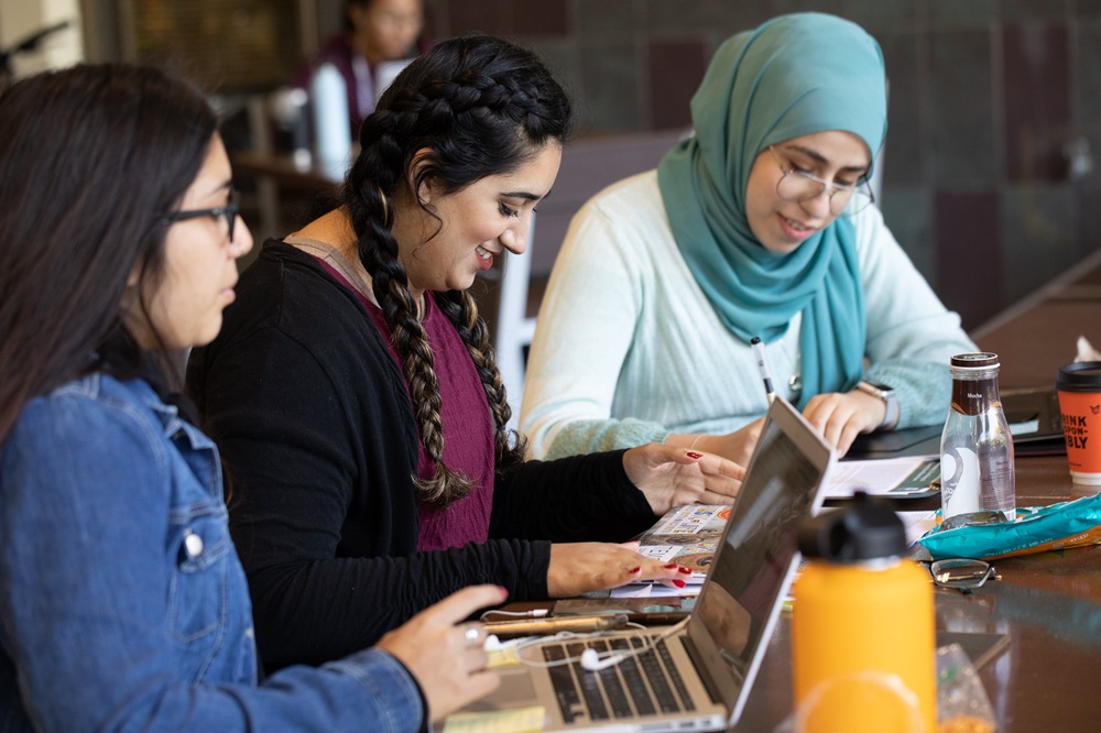 students studying at a table