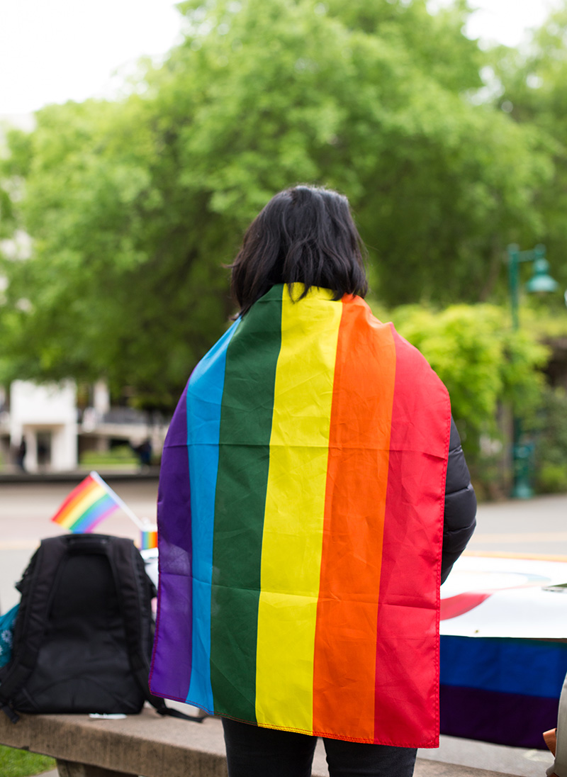 student with rainbow flag 